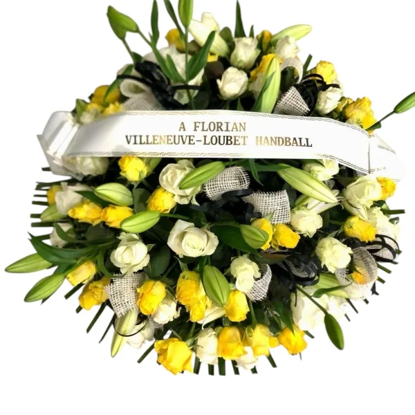 Coussin rond de roses jaunes et blanches