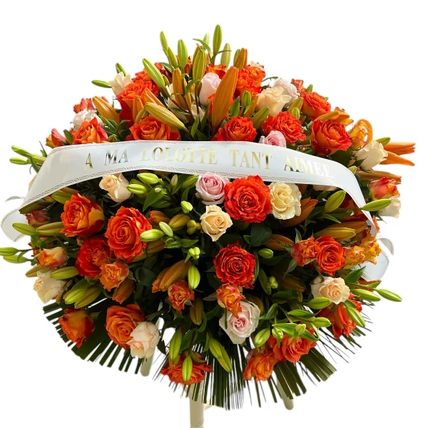 Coussin rond de roses oranges et roses pastel