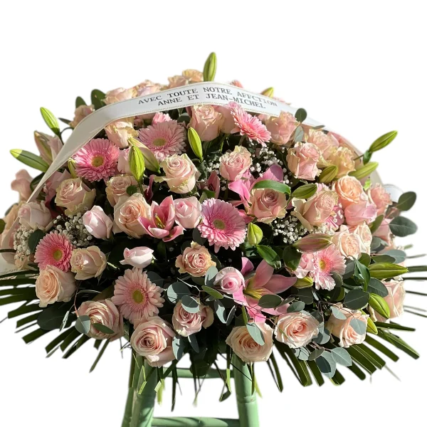 Coussin rond de roses pastel et gerberas roses