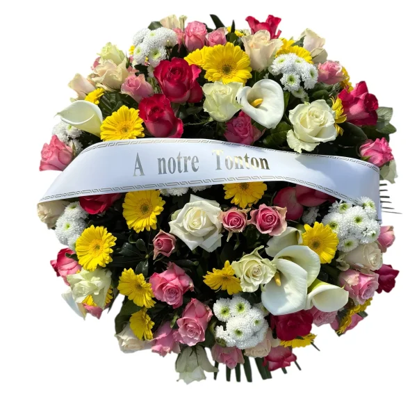Coussin rond jaune, rose et blanc