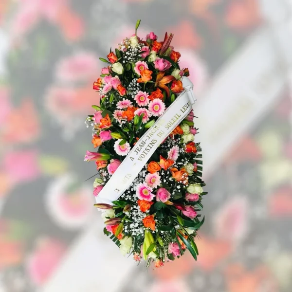 Dessus de cercueil roses orangerose et gerbera rose